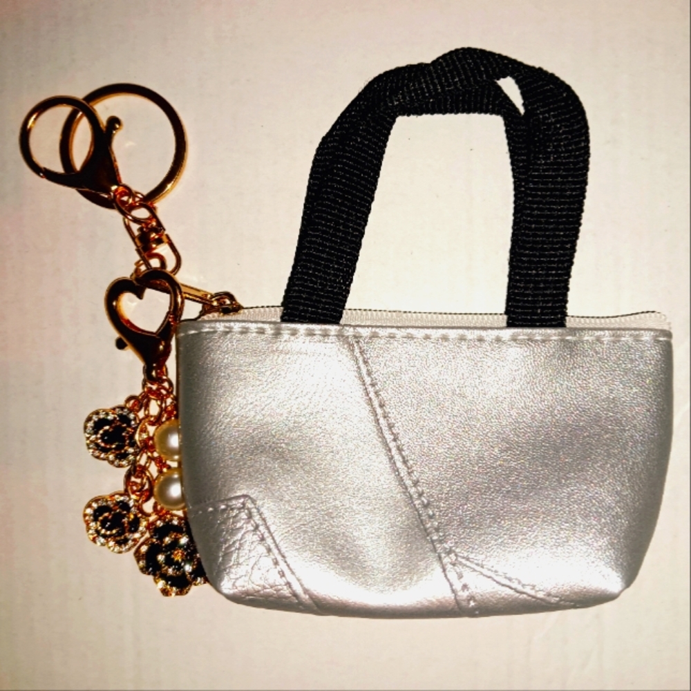 Silver min bag with charm